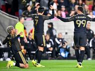 Feb 21, 2026; Los Angeles, California, USA; Los Angeles FC forward David Martínez (30) celebrates his goal with forward Son Heung-Min (7) and forward Denis Bouanga (99) during the first half against Inter Miami CF at Los Angeles Memorial Coliseum. Mandatory Credit: Kelvin Kuo-Imagn Images