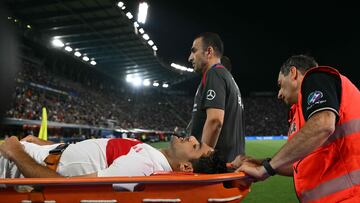 Turkey's defender #15 Ozan Kabak leaves the pitch on a stretcher during the international friendly football match between Italy and Turkey as part of their preparation for the UEFA Euro 2024 European football championships, at the Dall'Ara Stadium on June 4, 2024 in Bologna. (Photo by Alberto PIZZOLI / AFP)