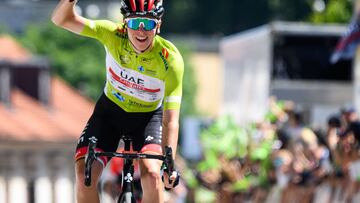 Slovenia�s cyclist Tadej Pogacar reacts as he crosses the finish line to win the 5th and last stage (155,7 km from Vrhnika to Novo mesto) during the Tour of Slovenia cycling race in Ljubljana on June 19, 2022. (Photo by Jure Makovec / AFP)