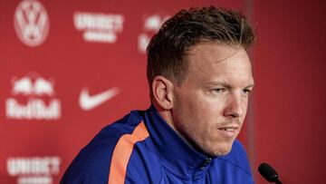 This handout photo taken and released by German first division Bundesliga football club RB Leipzig on April 27, 2021 shows outgoing coach Julian Nagelsmann addressing a press conference in Leipzig. - At 33, Julian Nagelsmann, is returning to Munich, the c