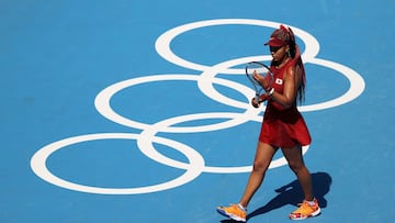 TOKYO, JAPAN - JULY 25: Naomi Osaka of Team Japan prepares to receive serve during her Women&#039;s Singles First Round match against Saisai Zheng of Team China on day two of the Tokyo 2020 Olympic Games at Ariake Tennis Park on July 25, 2021 in Tokyo, Ja