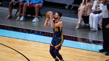 Apr 1, 2021; Miami, Florida, USA; Golden State Warriors guard Stephen Curry (30) attempts a three-point shot during the fourth quarter of a game against the Miami Heat at American Airlines Arena. Mandatory Credit: Mary Holt-USA TODAY Sports