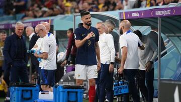 France's forward #09 Olivier Giroud (C) celebrates with staff members after he scored during the Qatar 2022 World Cup Group D football match between France and Australia at the Al-Janoub Stadium in Al-Wakrah, south of Doha on November 22, 2022. (Photo by FRANCK FIFE / AFP) (Photo by FRANCK FIFE/AFP via Getty Images)