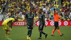 NASHVILLE, TN - SEPTEMBER 10: Los Angeles Galaxy midfielder Víctor Vázquez (7) is shown a yellow card from the game official after pulling down Nashville SC midfielder Hany Mukhtar (10) during a match between Nashville SC and Los Angeles Galaxy, September 10, 2022 at GEODIS Park in Nashville, Tennessee. (Photo by Matthew Maxey/Icon Sportswire via Getty Images)