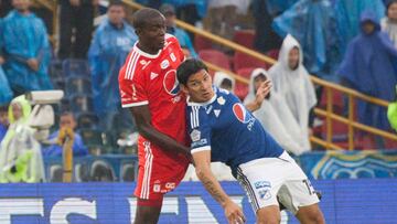 Roberto Ovelar y Danilo Arboleda en la disputa del bal&oacute;n en el partido entre Millonarios y Am&eacute;rica por la Liga &Aacute;guila I-2018