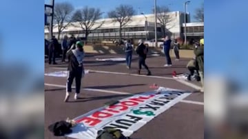 Social media videos show people abandoning their cars to walk to the Chicago airport after outbound lanes on Kennedy Expressway were blocked by protesters.