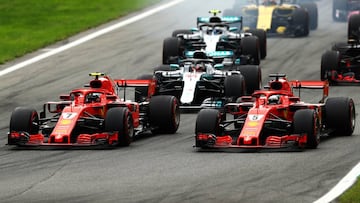 MONZA, ITALY - SEPTEMBER 02:  Kimi Raikkonen of Finland driving the (7) Scuderia Ferrari SF71H and Sebastian Vettel of Germany driving the (5) Scuderia Ferrari SF71H race to the first corner ahead of Lewis Hamilton of Great Britain driving the (44) Mercedes AMG Petronas F1 Team Mercedes WO9 during the Formula One Grand Prix of Italy at Autodromo di Monza on September 2, 2018 in Monza, Italy.  (Photo by Dan Istitene/Getty Images)