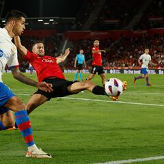 Soccer Football - LaLiga - RCD Mallorca v FC Barcelona - Son Moix, Palma, Mallorca, Spain - September 26, 2023 FC Barcelona's Joao Cancelo in action with RCD Mallorca's Jose Manuel Copete REUTERS/Albert Gea