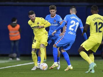 Alberto Moreno con Yannick Carrasco y Marcos Llorente.