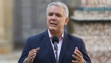 Colombian President Ivan Duque speaks after voting at a polling station in Bogota on March 13, 2022. - Colombians began voting this Sunday to elect a new Congress and define the list of candidates that will face Senator and former guerrilla Gustavo Petro in the presidential elections on May 29, in which the left is the favorite for the first time. (Photo by Juan Pablo Pino / AFP) (Photo by JUAN PABLO PINO/AFP via Getty Images)