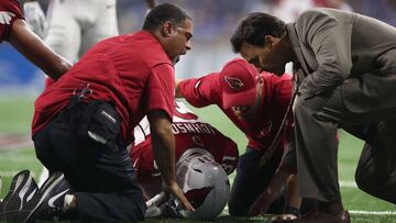DETROIT, MI - SEPTEMBER 10: David Johnson #31 of the Arizona Cardinals is attended to by medical staff after a second half injury while playing the Detroit Lions at Ford Field on September 10, 2017 in Detroit, Michigan. Detroit won the game 35-23. Gregory Shamus/Getty Images/AFP
== FOR NEWSPAPERS, INTERNET, TELCOS & TELEVISION USE ONLY ==