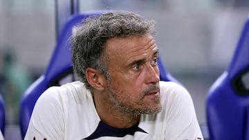 Paris Saint-Germain's coach Luis Enrique looks on from the bench before the friendly football match between France's Paris Saint-Germain and Japan's Cerezo Osaka at Nagai Stadium in Osaka on July 28, 2023. (Photo by PAUL MILLER / AFP)