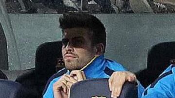 Piqué, ayer, en el banquillo.
