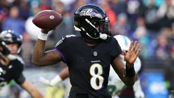 BALTIMORE, MARYLAND - DECEMBER 31: Lamar Jackson #8 of the Baltimore Ravens throws a pass against the Miami Dolphins during the second half of the game at M&T Bank Stadium on December 31, 2023 in Baltimore, Maryland.   Todd Olszewski/Getty Images/AFP (Photo by Todd Olszewski / GETTY IMAGES NORTH AMERICA / Getty Images via AFP)