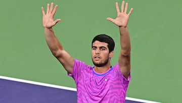 Spain's Carlos Alcaraz celebrates victory over Italy's Jannik Sinner during the ATP-WTA Indian Wells Masters men's semifinal tennis match at the Indian Wells Tennis Garden in Indian Wells, California, on March 16, 2024. (Photo by Frederic J. BROWN / AFP)