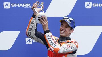 MotoGP - French Grand Prix - Circuit Bugatti, Le Mans, France - October 11, 2020 Repsol Honda's Alex Marquez celebrates with the second placed trophy on the podium after the race REUTERS/Stephane Mahe