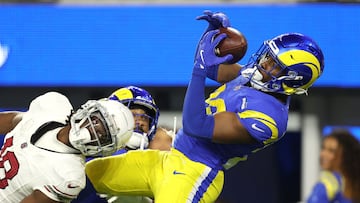 INGLEWOOD, CALIFORNIA - DECEMBER 28: Kamren Kinchens #26 of the Los Angeles Rams intercepts a pass intended for Marvin Harrison Jr. #18 of the Arizona Cardinals during the fourth quarter at SoFi Stadium on December 28, 2024 in Inglewood, California. Harry How/Getty Images/AFP (Photo by Harry How / GETTY IMAGES NORTH AMERICA / Getty Images via AFP)