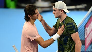 Britain's Jack Draper (R) and Italy's Lorenzo Musetti embrace after Draper won their men's singles match at the Next Generation ATP Finals tennis tournament on November 10, 2022 in Milan. (Photo by Miguel MEDINA / AFP)