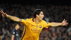 Suárez rescues Barcelona after scorer Torres sees red