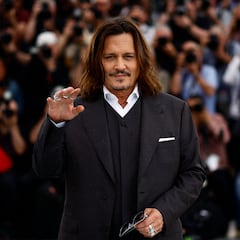 What charities did Johnny Depp donate the $1 million to that he received from Amber Heard?