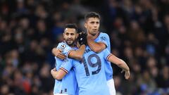 MANCHESTER, ENGLAND - NOVEMBER 02: Riyad Mahrez of Manchester City celebrates their third goal with Julian Alvarez and Rodri of Manchester City during the UEFA Champions League group G match between Manchester City and Sevilla FC at Etihad Stadium on November 2, 2022 in Manchester, United Kingdom. (Photo by Simon Stacpoole/Offside/Offside via Getty Images)