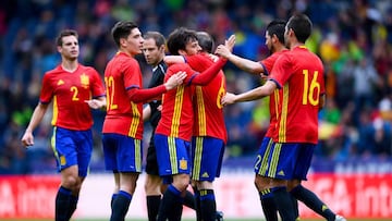 David Silva celebrates with his teammates after scoring the opening goal during an international friendly match between Spain and Korea at the Red Bull Arena stadium on June 1, 2016 in Salzburg, Austria.