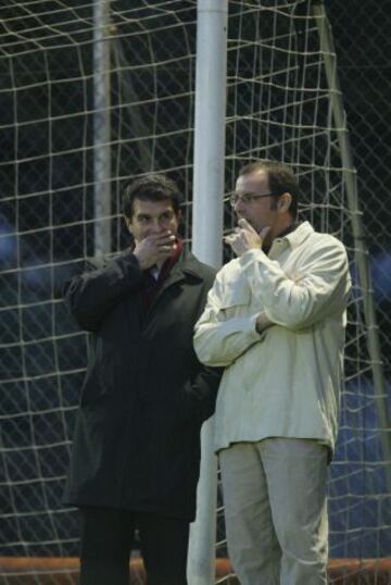 Laporta y Rosell durante un entrenamiento del Barcelona en 2004.