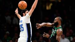 Boston Celtics guard Jaylen Brown (7) passes the ball through the defense of Orlando Magic center Goga Bitadze (35) during the first half at TD Garden.