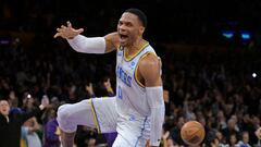 Dec 13, 2022; Los Angeles, California, USA; Los Angeles Lakers guard Russell Westbrook (0) after a dunk in the second half against the Boston Celtics at Crypto.com Arena. Mandatory Credit: Jayne Kamin-Oncea-USA TODAY Sports