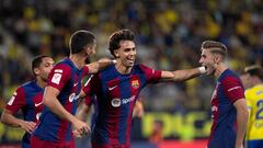 Barcelona's Portuguese forward #14 Joao Felix celebrates after scoring with teammates  during the Spanish league football match between Cadiz CF and FC Barcelona at the Nuevo Mirandilla stadium in Cadiz on April 13, 2024. (Photo by JORGE GUERRERO / AFP)