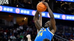 LAS VEGAS, NEVADA - MARCH 14: Kenneth Nwuba #14 of the UCLA Bruins grabs a rebound against the Oregon Ducks in the first half of a quarterfinal game of the Pac-12 Conference basketball tournament at T-Mobile Arena on March 14, 2024 in Las Vegas, Nevada.   David Becker/Getty Images/AFP (Photo by David Becker / GETTY IMAGES NORTH AMERICA / Getty Images via AFP)