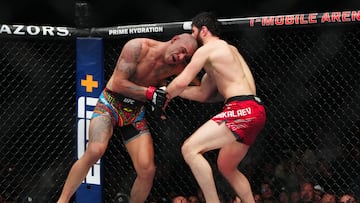 Mar 8, 2025; Las Vegas, Nevada, USA; Alex Pereira (red gloves) fights Magomed Ankalaev (blue gloves) during UFC 313 at T-Mobile Arena. Mandatory Credit: Stephen R. Sylvanie-Imagn Images