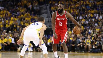 OAKLAND, CA - MAY 26:  James Harden #13 of the Houston Rockets controls the ball against Stephen Curry #30 of the Golden State Warriors during Game Six of the Western Conference Finals in the 2018 NBA Playoffs at ORACLE Arena on May 26, 2018 in Oakland, California. NOTE TO USER: User expressly acknowledges and agrees that, by downloading and or using this photograph, User is consenting to the terms and conditions of the Getty Images License Agreement.  (Photo by Ezra Shaw/Getty Images)