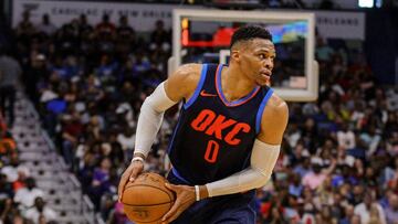 Apr 1, 2018; New Orleans, LA, USA; Oklahoma City Thunder guard Russell Westbrook (0) is defended by New Orleans Pelicans forward E'Twaun Moore (55) during the second half at the Smoothie King Center. The Thunder defeated the Pelicans 109-104. Mandatory Credit: Derick E. Hingle-USA TODAY Sports