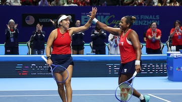 USA's Taylor Townsend (R) and Jessica Pegula react after a point against Kazakhstan's Elena Rybakina and Yulia Putintseva during their women�s doubles tennis match at the Billie Jean King Cup quarter-finals in Shenzhen, China�s southern Guangdong province on September 18, 2025. (Photo by AFP) / China OUT