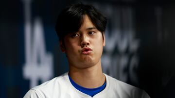 Seoul (Korea, Republic Of), 21/03/2024.- Japanese player Shohei Ohtani of the Los Angeles Dodgers looks on at dugout prior to the start of the 2024 MLB Seoul Series game between the Los Angeles Dodgers and the San Diego Padres at Gocheok Sky Dome in Seoul, South Korea, 21 March 2024. According to reports on Major League Baseball website, Los Angeles Dodgers designated hitter Shohei Ohtani's translator and close friend, Ippei Mizuhara, has been fired by the LA Dodgers following accusations from Ohtani's lawyers. Ohtani's legal team has claimed that Mizuhara allegedly used Ohtani's funds for betting activities with an illegal bookmaker, who is currently under federal investigation. (Japón, Corea del Sur, Seúl) EFE/EPA/JEON HEON-KYUN