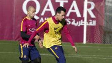 Busquets y Mascherano, en un entrenamiento.