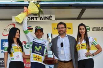 Movistar's Colombian rider Nairo Quintana (2ndL) celebrates his jersey of overall leader on the podium of the Stage 4 of the 96th Volta Catalunya 2016, a 172,2 km ride from Baga to Port Aine, in la Molina on March 24, 2016.

 / AFP PHOTO / JOSEP LAGO