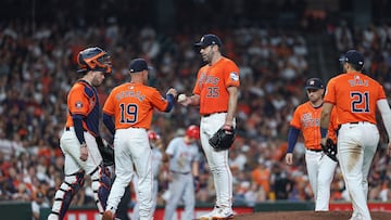 Sep 20, 2024; Houston, Texas, USA; Houston Astros starting pitcher Justin Verlander (35) hands the ball to manager Joe Espada (19) during a pitching change in the fifth inning against the Los Angeles Angels at Minute Maid Park. Mandatory Credit: Troy Taormina-Imagn Images
