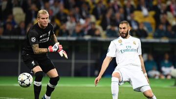 Karim Benzema deflects the ball past Loris Karius during the 2018 Champions League final.