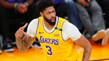 May 25, 2021; Phoenix, Arizona, USA; Los Angeles Lakers forward Anthony Davis celebrates a three point shot against the Phoenix Suns during the second half in game two of the first round of the 2021 NBA Playoffs at Phoenix Suns Arena. Mandatory Credit: Mark J. Rebilas-USA TODAY Sports