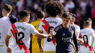 Soccer Football - LaLiga - Rayo Vallecano v Real Madrid - Campo de Futbol de Vallecas, Madrid, Spain - February 18, 2024 Rayo Vallecano's Alfonso Espino shakes hands with Real Madrid's Arda Guler after the match REUTERS/Ana Beltran