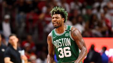MIAMI, FLORIDA - MAY 19: Marcus Smart #36 of the Boston Celtics reacts after a three point basket during the fourth quarter against the Miami Heat in Game Two of the 2022 NBA Playoffs Eastern Conference Finals at FTX Arena on May 19, 2022 in Miami, Florida. NOTE TO USER: User expressly acknowledges and agrees that, by downloading and or using this photograph, User is consenting to the terms and conditions of the Getty Images License Agreement.   Michael Reaves/Getty Images/AFP
 == FOR NEWSPAPERS, INTERNET, TELCOS &amp; TELEVISION USE ONLY ==