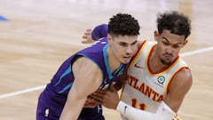 CHARLOTTE, NORTH CAROLINA - JANUARY 09: LaMelo Ball #2 of the Charlotte Hornets dribbles against Trae Young #11 of the Atlanta Hawks during the third quarter of their game at Spectrum Center on January 09, 2021 in Charlotte, North Carolina. NOTE TO USER: User expressly acknowledges and agrees that, by downloading and or using this photograph, User is consenting to the terms and conditions of the Getty Images License Agreement.   Jared C. Tilton/Getty Images/AFP
 == FOR NEWSPAPERS, INTERNET, TELCOS &amp; TELEVISION USE ONLY ==