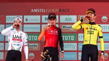 Berg En Terblijt (Netherlands), 14/04/2024.- (L-R) Second placed Swiss rider Marc Hirschi of UAE Team Emirates, winner British rider Thomas Pidcock of INEOS Grenadier, and third placed Belgian rider Tiesj Benoot of Team Visma Lease a Bike celebrate on the podium after the Amstel Gold Race cycling classic, a one-day race over 253.6km from Maastricht to Berg en Terblijt, Netherlands, 14 April 2024. (Ciclismo, Pa¨ªses Bajos; Holanda) EFE/EPA/Vincent Jannink