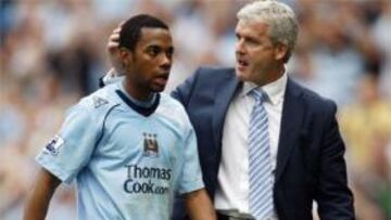 Robinho junto a Mark Hughes