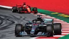 Spielberg (Austria), 01/07/2018.- British Formula One driver Lewis Hamilton (front) of Mercedes AMG GP and German Formula One driver Sebastian Vettel (back) of Scuderia Ferrari in action during the Formula One Grand Prix of Austria at the Red Bull Ring ci