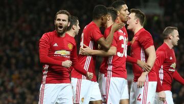 MANCHESTER, ENGLAND - JANUARY 10: Juan Mata of Manchester United celebrates scoring their first goal during the EFL Cup Semi-Final first leg match between Manchester United and Hull City at Old Trafford on January 10, 2017 in Manchester, England. (Photo