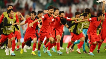 Soccer Football - FIFA World Cup Qatar 2022 - Group H - South Korea v Portugal - Education City Stadium, Al Rayyan, Qatar - December 2, 2022  South Korea's Hwang In-beom celebrates after the match as South Korea qualify for the knockout stages REUTERS/Wolfgang Rattay