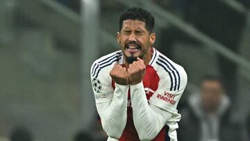 Arsenal's French defender #02 William Saliba reacts during the UEFA Champions League football match between Inter Milan and Arsenal at the San Siro stadium in Milan on November 6, 2024. (Photo by Gabriel BOUYS / AFP)
